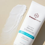 freezeframe BREAST ENHANCER cream texture next to product tube