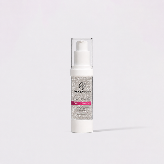 Freezeframe FLASH WHITE brightening serum for dark spots, pigmentation and uneven skin tone in a white airless pump bottle. 