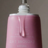 freezeframe Instant EXOSOME LIFT close-up on product dispenser showing clear gel texture