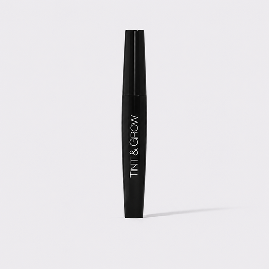 Freezeframe Tint & Grow lash tint and lash growth serum in a black tube for darker, longer-looking lashes.