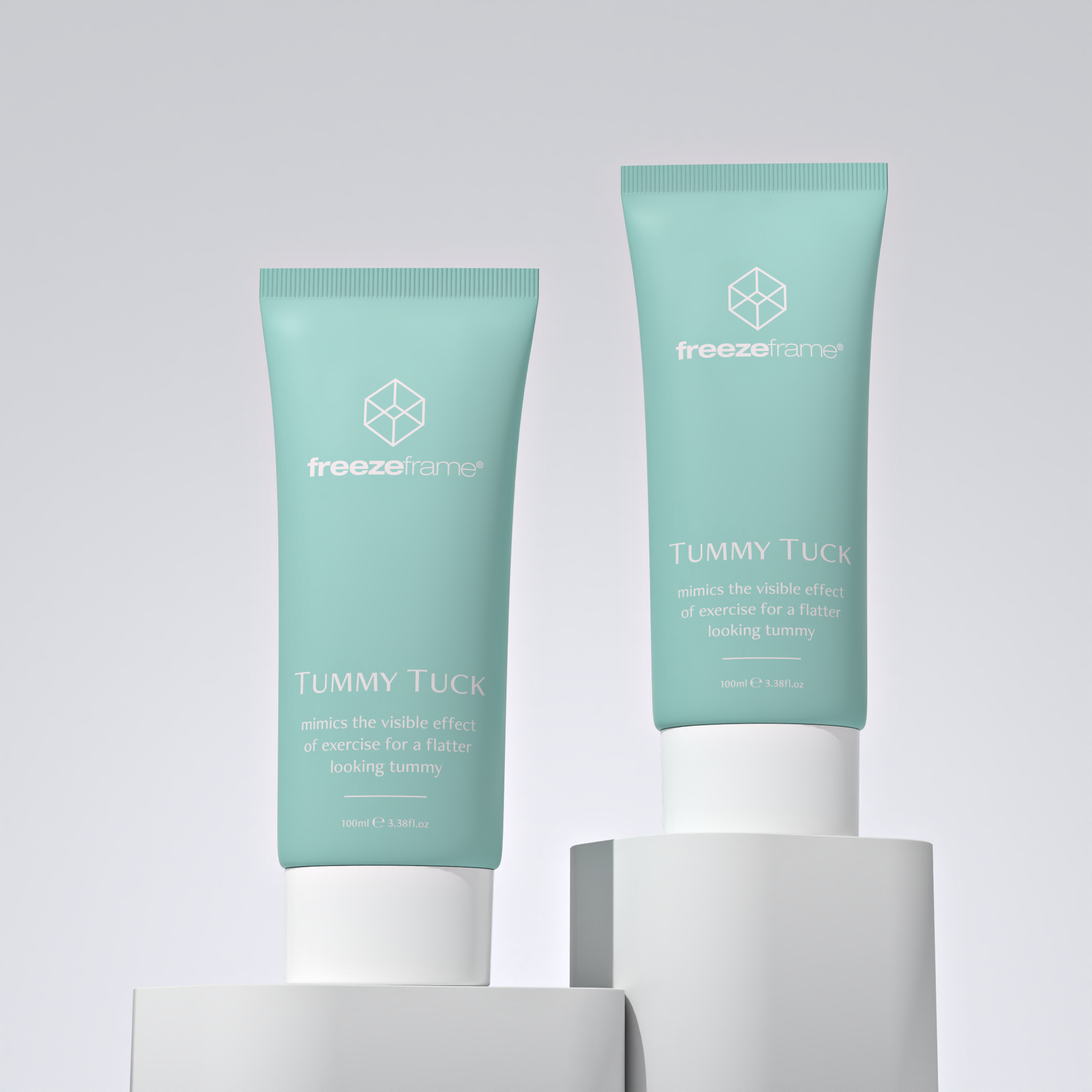 freezeframe TUMMY TUCK product duo on pedestals side-by-side