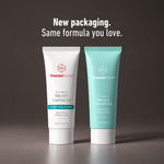 freezeframe BREAST ENHANCER non-surgical breast enhancing cream in its original white and new turquoise 100ml packaging, featuring the same formula for larger, firmer-looking breasts.