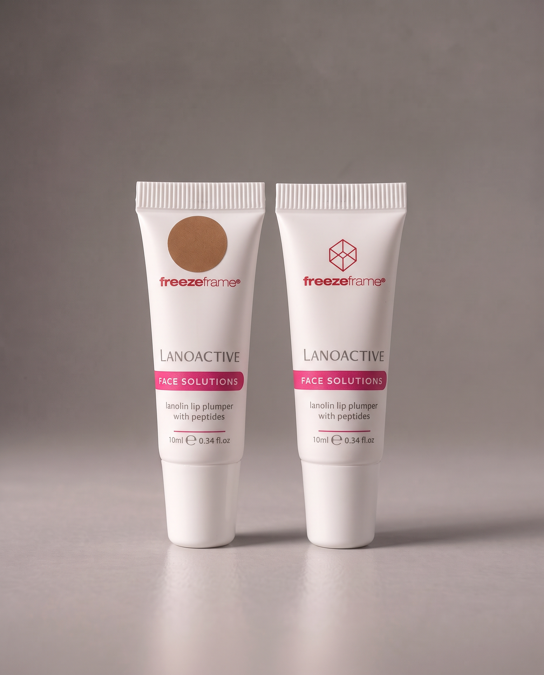 freezeframe LANOACTIVE Duo Bundle featuring two 10ml lanolin lip plumpers with peptides: LANOACTIVE Clear for a natural finish and NEW LANOACTIVE Tinted in 90s Nude for a polished, effortless look.