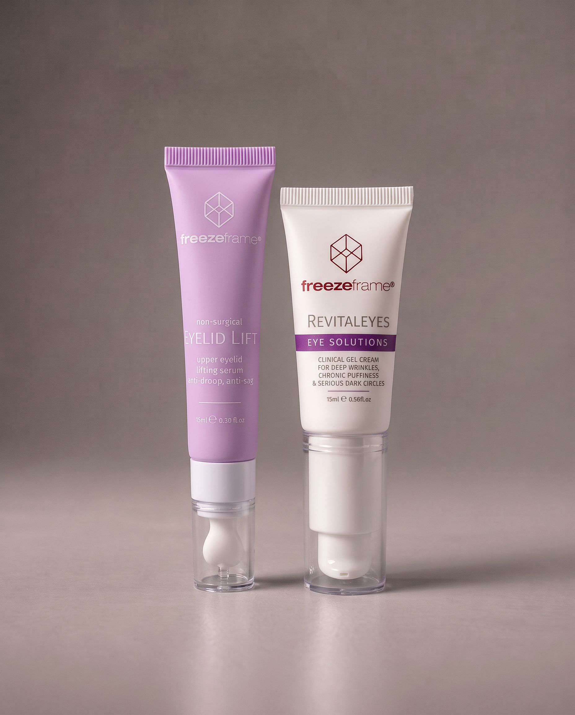 freezeframe TOTAL EYE REPAIR SET featuring EYELID LIFT 15ml upper eyelid lifting serum with cooling ceramic applicator and REVITALEYES 15ml eye cream for wrinkles, puffiness and dark circles.